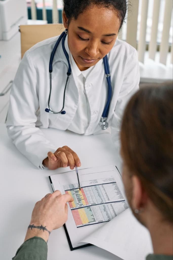 Doctor consulting with patient